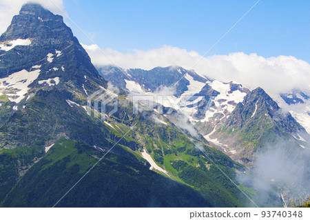The Caucasus Mountains. Mountain peaks in summer. 93740348
