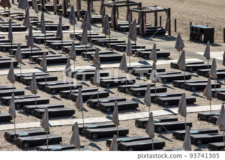 Romantic beach beds for relax and sunbathing. Resort and vacation 93741305