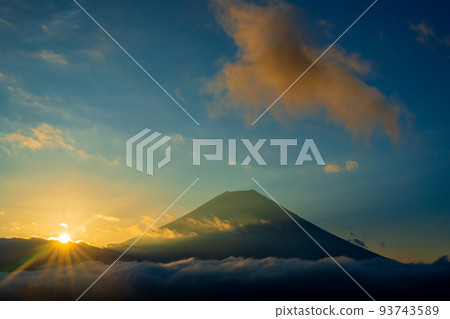 Mount Fuji at sunrise and sunrise clouds Mount Fuji at sunrise and sunrise clouds 93743589
