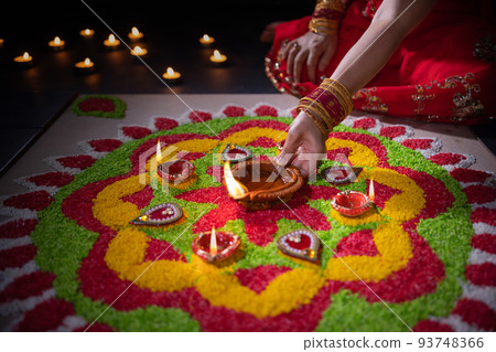 Traditional diya lamps lit during diwali celebration 93748366