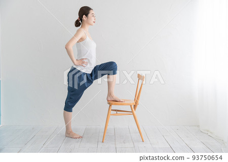 Women who stretch and do gymnastics 93750654