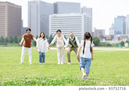 Families walking in the park Families walking in the park 93752716