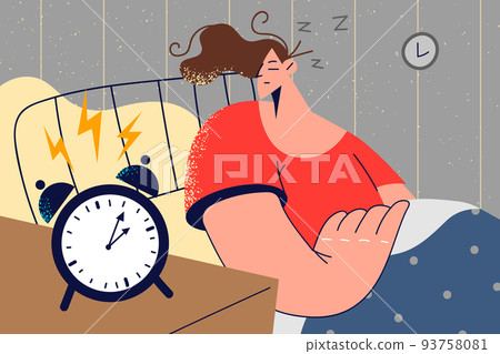 Sleepy woman awaken to alarm  93758081