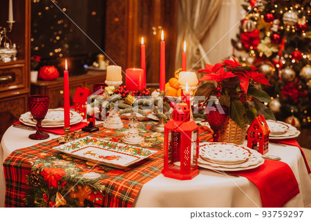 Christmas serving at home on the background of the Christmas tree. Christmas serving at home on the background of the Christmas tree. 93759297