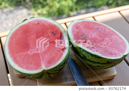 Cut the watermelon on the veranda Cut the watermelon on the veranda 93762174