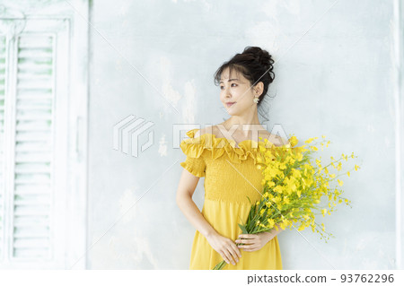 young woman in yellow dress young woman in yellow dress 93762296