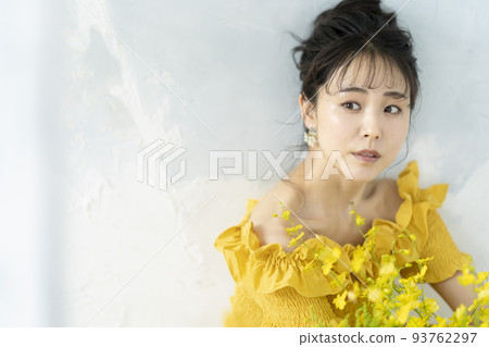 young woman in yellow dress young woman in yellow dress 93762297