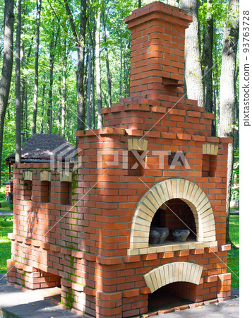 brick russian stove in green city park brick russian stove in green city park 93763728
