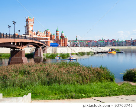 overgrown waterfront near bridge in Yoshkar-Ola overgrown waterfront near bridge in Yoshkar-Ola 93763745