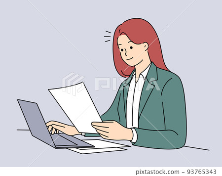 Successful businesswoman work on laptop with paperwork  93765343
