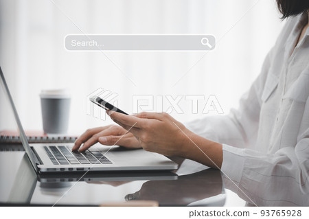 closeup woman hands using smart phone with search tab icon 93765928