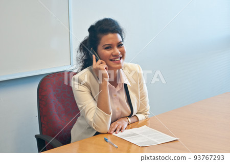 Business woman call to inquire more details and talk Business woman call to inquire more details and talk 93767293