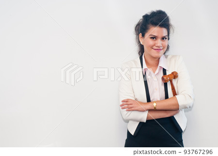 Woman holding judge hammer on white background Woman holding judge hammer on white background 93767296
