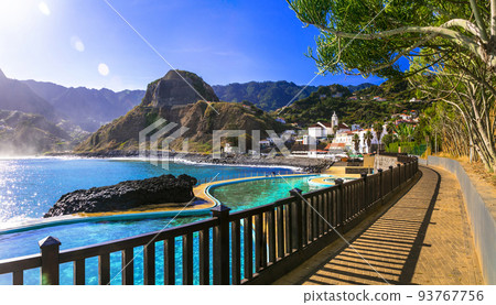 Scenic Madeira island, natural swimming pools of charming Porto da Cruz village. Popular tourist resort in Portugal 93767756