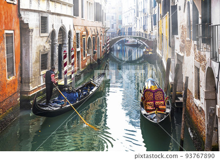 Romantic Venetian canals and gondolas. Venice, Italy 93767890