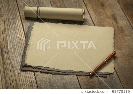 sheets of blank handmade paper with rough edges 93770119