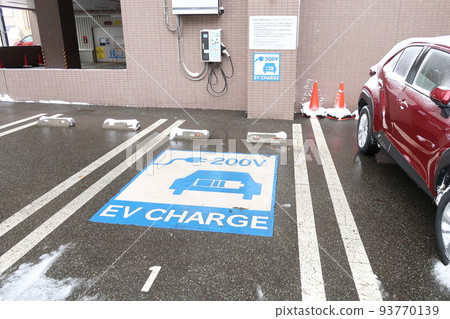 Electric car charging station installed at the hotel 93770139