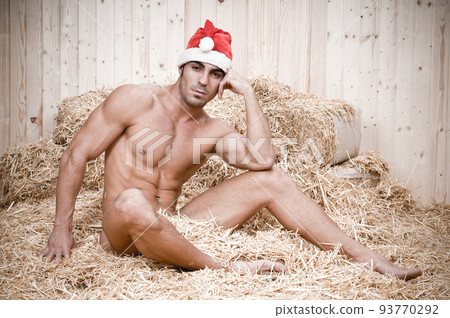 muscled claus in a barn before christmas muscled claus in a barn before christmas 93770292