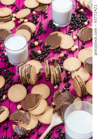 children's snack based on cookies, chocolate and milk 93772421