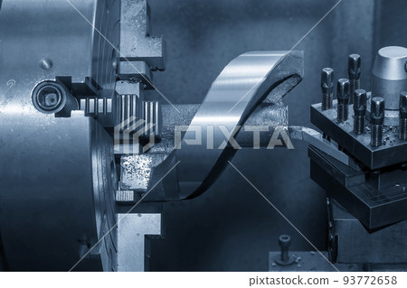 The lathe machine rough cutting the die casting part  by lathe tools. 93772658