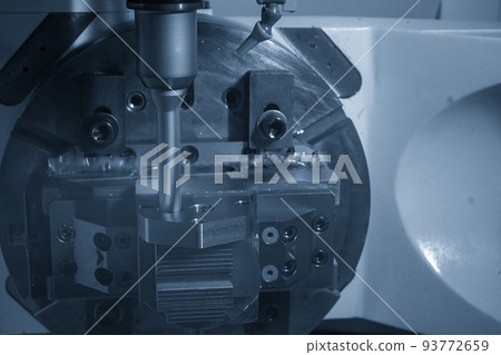 The 5-axis CNC milling machine hole cutting on the metal mold part. The 5-axis CNC milling machine hole cutting on the metal mold part. 93772659