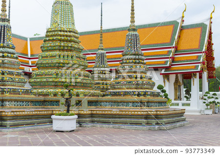 Classical Thai architecture of Wat Pho public temple in Bangkok, Thailand. 93773349