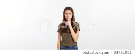 Beautiful woman showing finger over lips isolated on a white background. 93781091