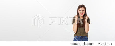 Isolated shot of speechless concerned shocked and angry woman, expressing silence and misconceptions, frightened. Isolated over grey background 93781403