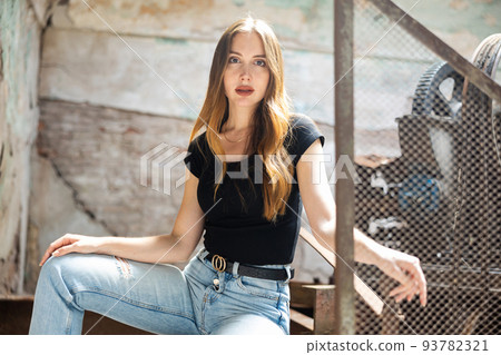 Portrait of attractive woman in abandoned building 93782321