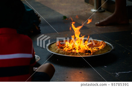 Burning scented powder in a metal tray Hindu ritual performed at Kataragama temple. Burning scented powder in a metal tray Hindu ritual performed at Kataragama temple. 93785391