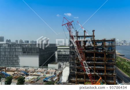 Wangan Toyosu area construction site crane truck undergoing redevelopment 93786434