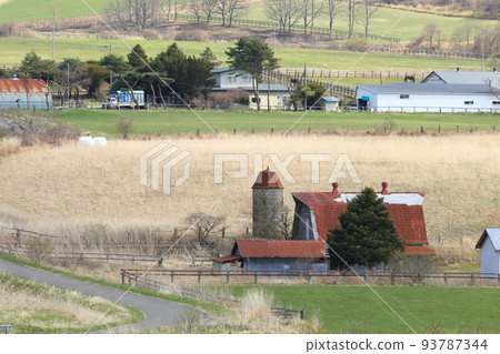 Scenery with a farm in the Hidaka region of Hokkaido 93787344