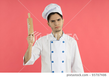Concept of profession, young attractive male chef Concept of profession, young attractive male chef 93787486