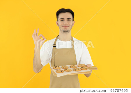 Concept of cooking with young attractive man 93787495