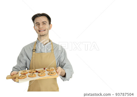 Concept of cooking with young attractive man isolated on white background 93787504