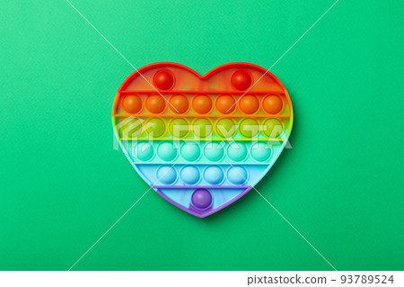 Pop it on mint background, top view Pop it on mint background, top view 93789524