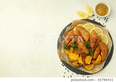 Concept of tasty food with chicken strips, space for text Concept of tasty food with chicken strips, space for text 93790431