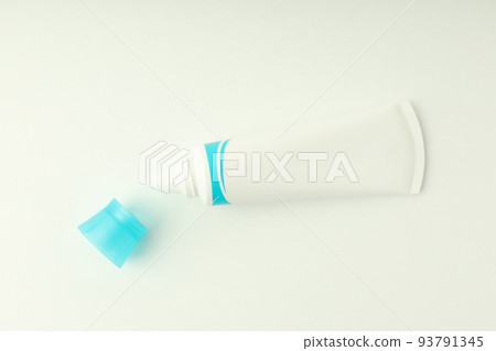Blank toothpaste tube on white background, space for text 93791345