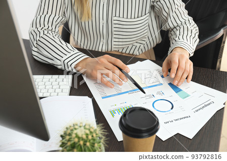 Young business woman working at her workplace 93792816