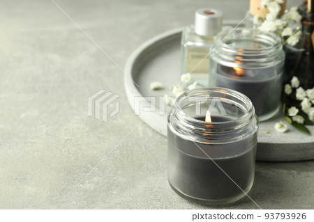 Concept of relaxation with aroma candles, space for text Concept of relaxation with aroma candles, space for text 93793926