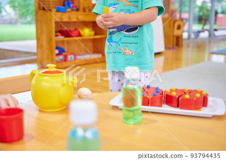 Toddlers playing, nursery school, childcare facility Toddlers playing, nursery school, childcare facility 93794435
