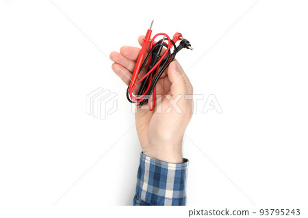 Male hand holds multimeter components, isolated on white background 93795243