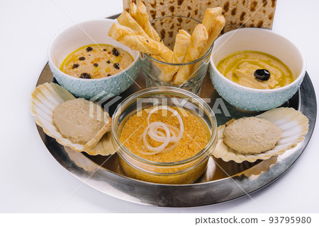 aperitif with hummus, mincemeat and pike caviar aperitif with hummus, mincemeat and pike caviar 93795980