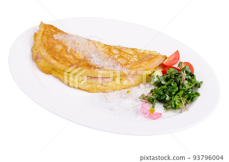 Omelette with ham cherry tomatoes on plate Omelette with ham cherry tomatoes on plate 93796004