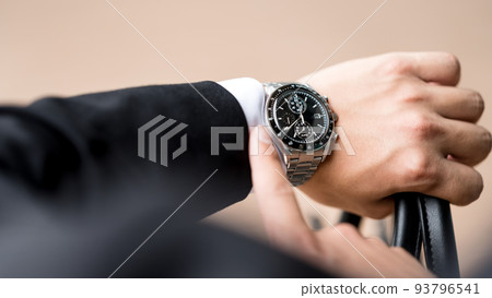 A man checking the time Businessman 93796541