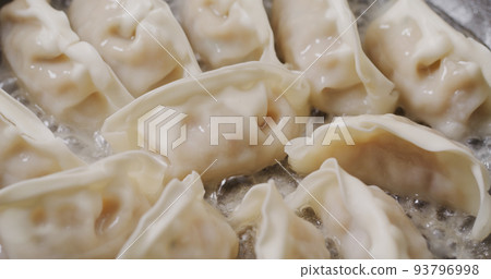 Grill dumpling in pan at kitchen Grill dumpling in pan at kitchen 93796998