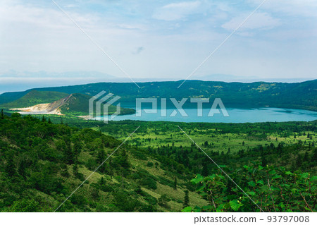 landscape of Kunashir Island, geothermal lakes among lava domes in the center of Golovnin volcano caldera landscape of Kunashir Island, geothermal lakes among lava domes in the center of Golovnin volcano caldera 93797008