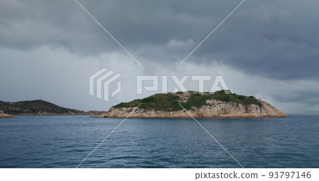 Beautiful island with storm cloud Beautiful island with storm cloud 93797146