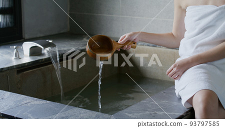 Woman enjoy her hot spring at winter time Woman enjoy her hot spring at winter time 93797585