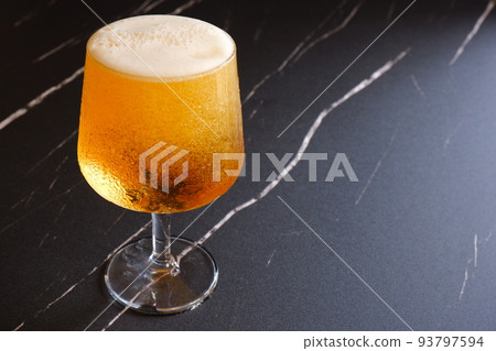 A well-chilled beer with fine bubbles A well-chilled beer with fine bubbles 93797594